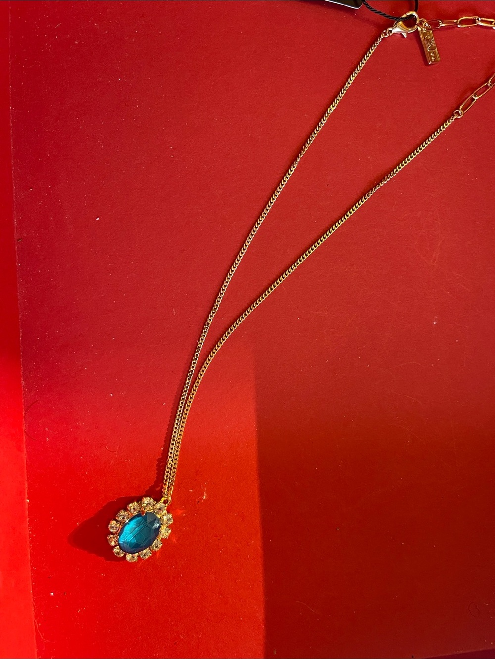 Tova Gold Necklace with Teal Blue Crystal Halo Pendant